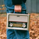 holding a radio