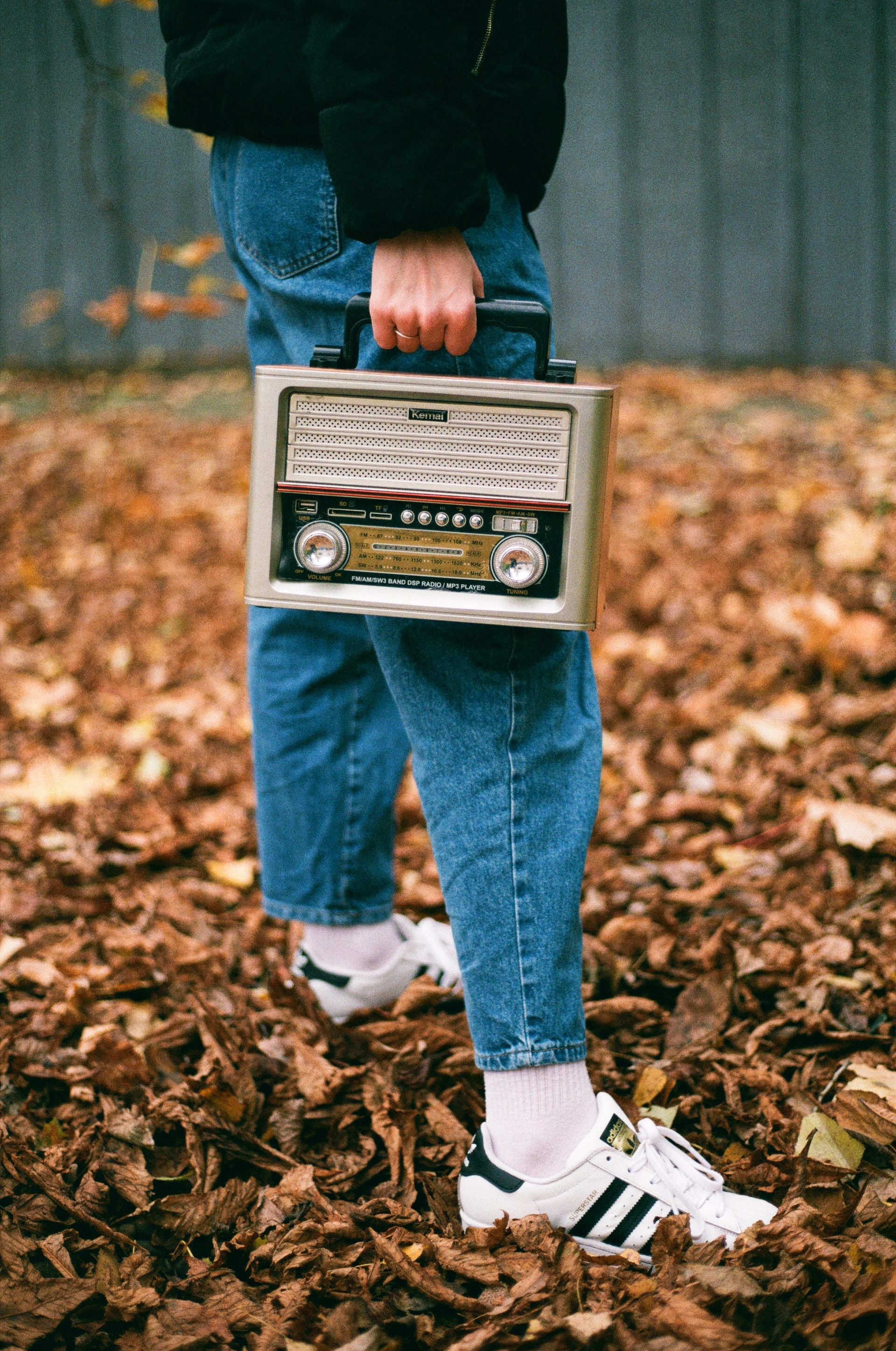 holding a radio