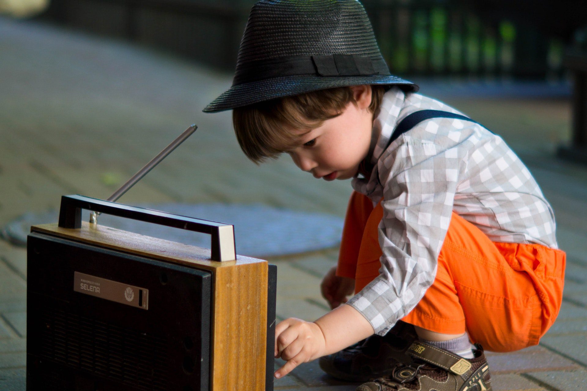 kid listening to radio